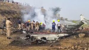 Rescue and police personnel search for survivors after an aircraft carrying Maharashtra Deputy Chief Mini